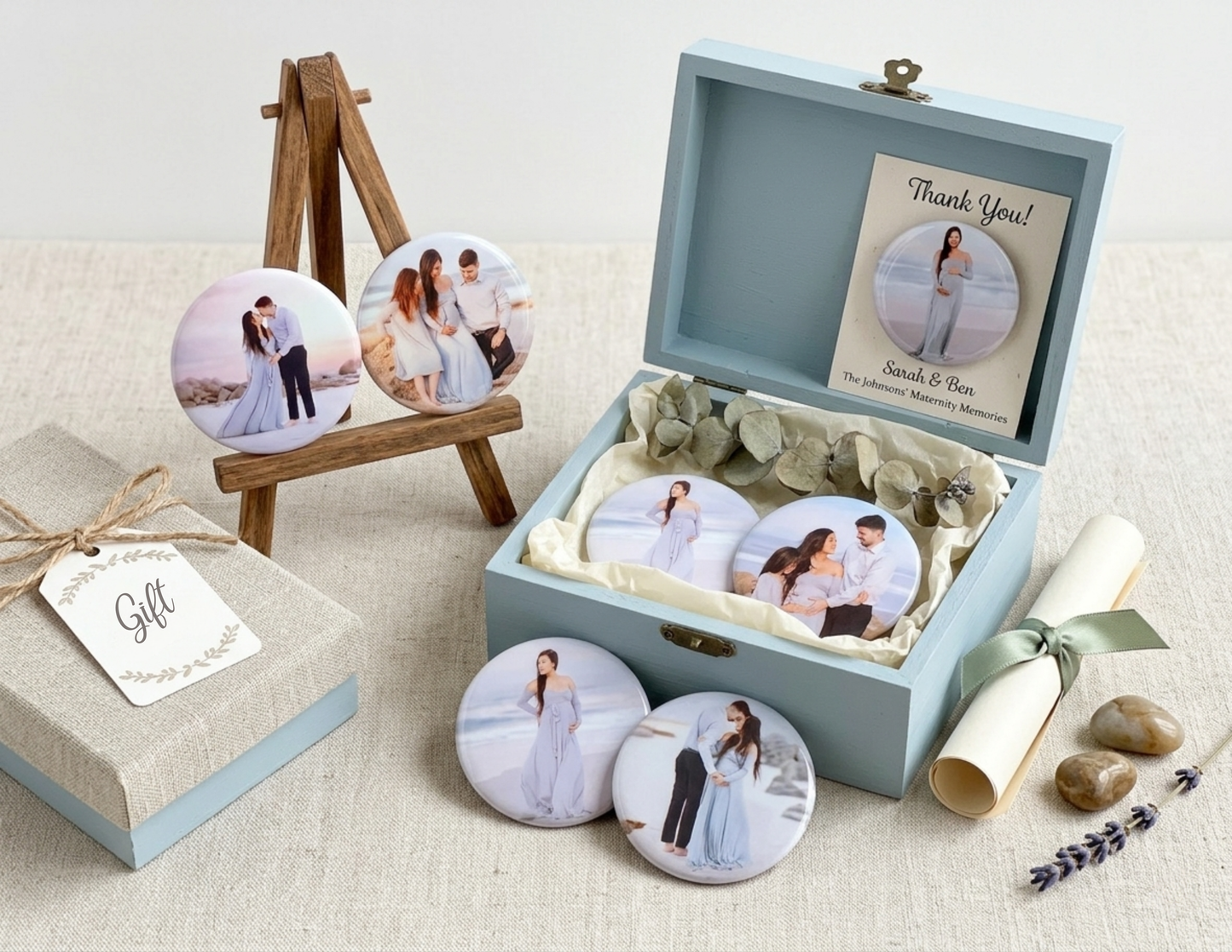 Personalized photo coasters and a decorative box with engraved text on a light surface.